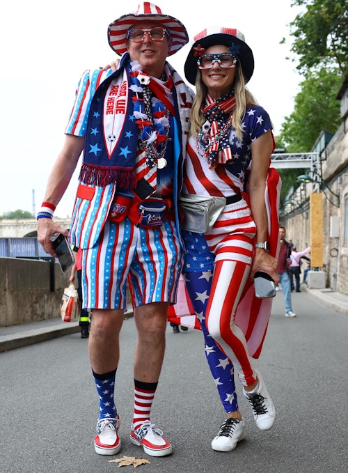 Fans bedecked in stars, stripes and miniature Eiffel Tower hats to celebrate Olympics opening 