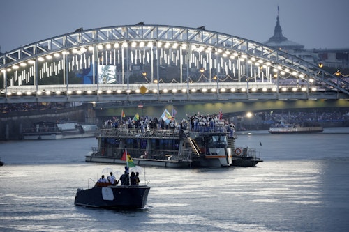 Water and light shows amid drizzle