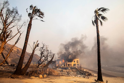 Fast-moving wildfires continue to burn