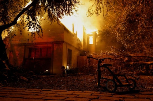 Fast-moving wildfires continue to burn