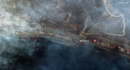 Fast-moving wildfires continue to burn