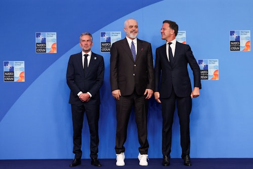 White sneakers and colourful ties at the family photo 