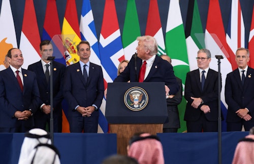 World leaders line up behind Trump on stage