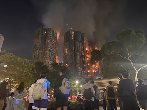 Residents watch as buildings burns 
