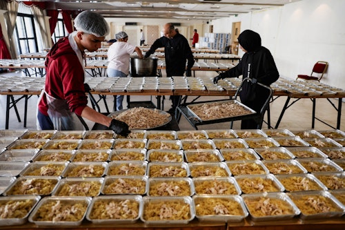 Volunteers prepare food for the displaced in Beirut