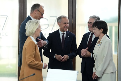 In pictures: Leaders arrive for the first session earlier